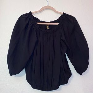 Off the shoulder half sleeved blouse.